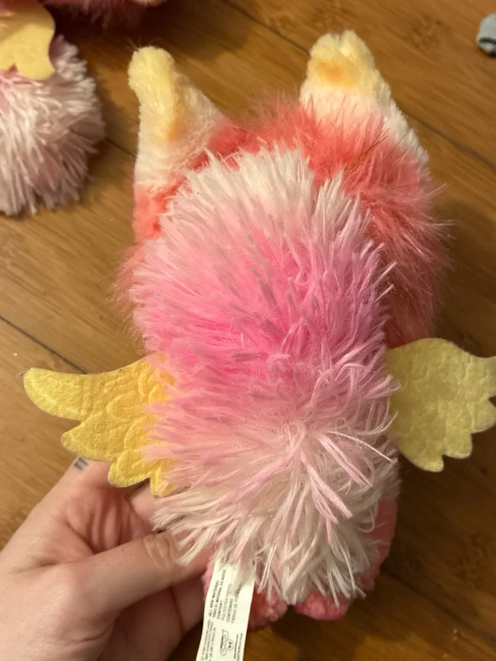 Magic mixies Pink and white plush toy with glittery blue eyes and horns